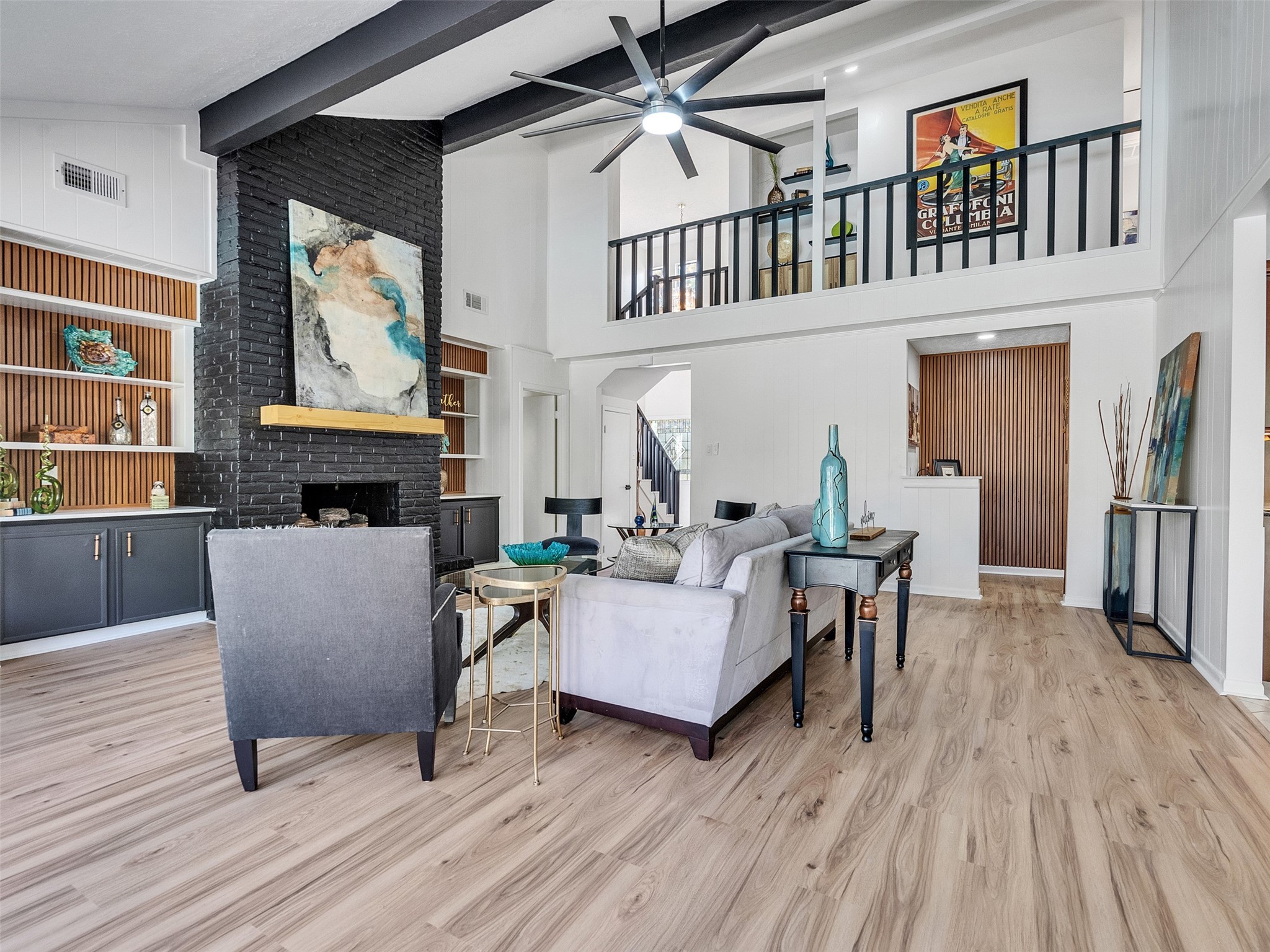 6510 Knollview Drive Spring, TX 77389 - Photo 16 of 43 a living room with furniture a window and a fireplace