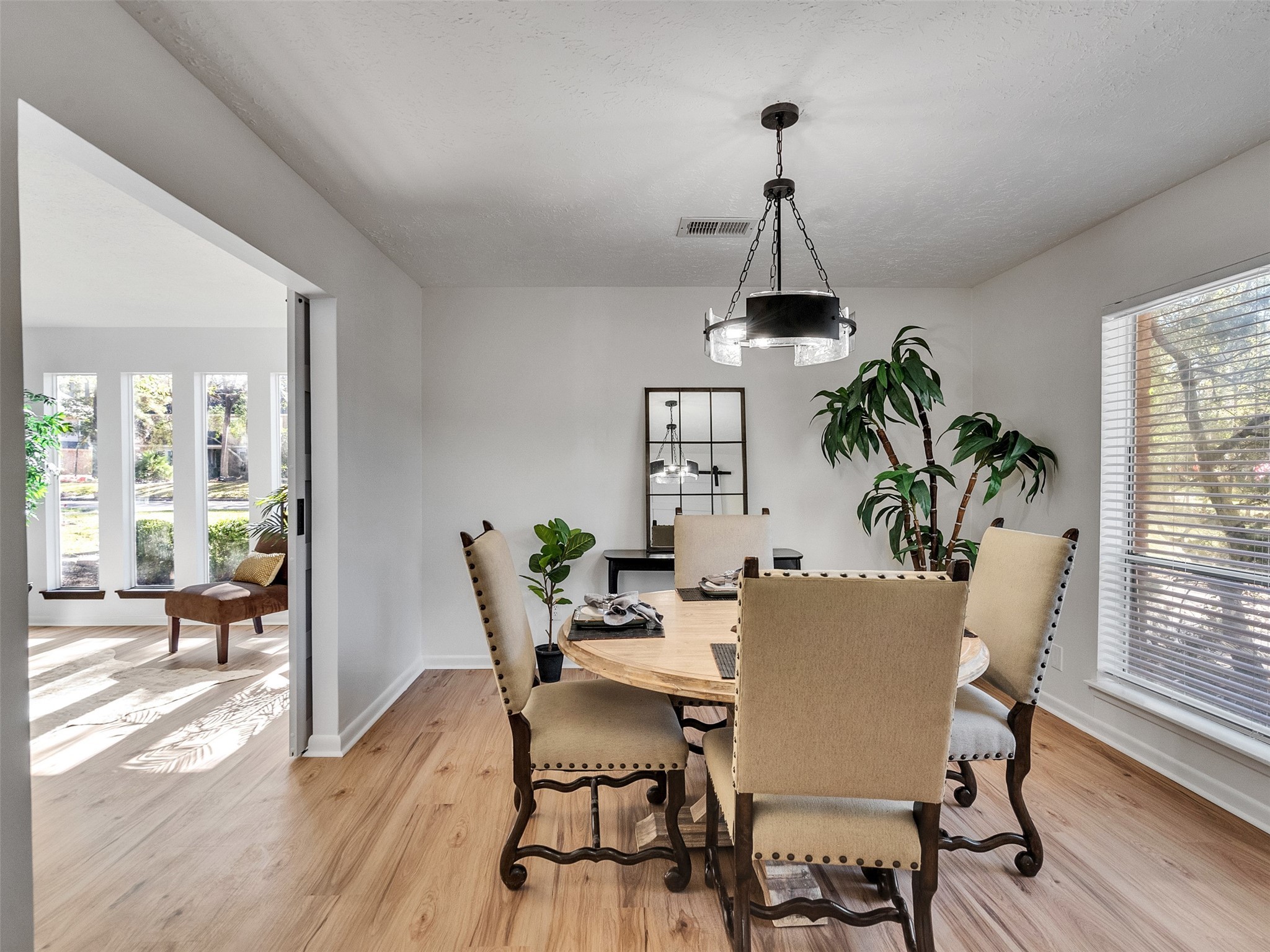 6510 Knollview Drive Spring, TX 77389 - Photo 21 of 43 a view of a dining room with furniture window and wooden floor