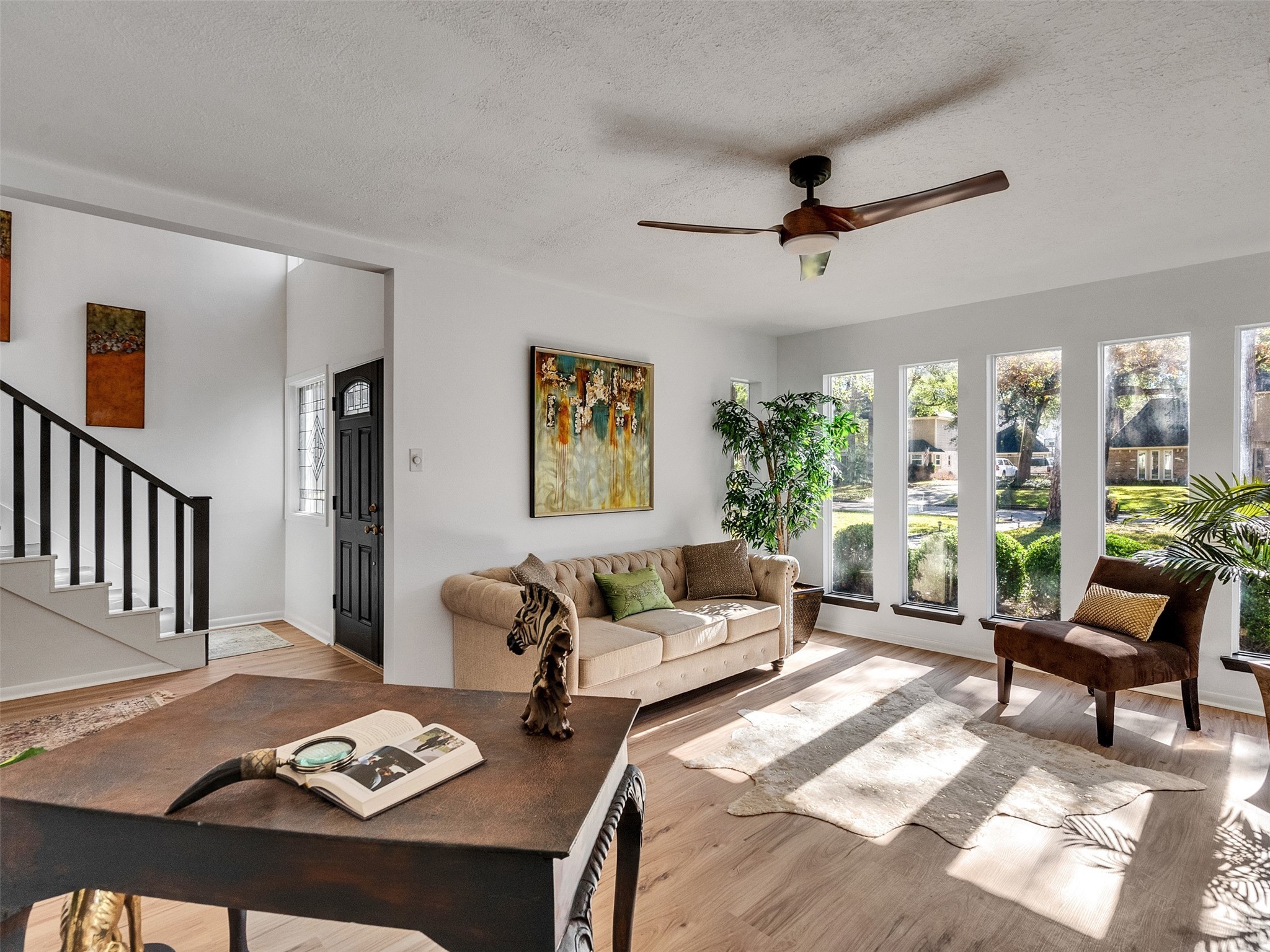 6510 Knollview Drive Spring, TX 77389 - Photo 23 of 43 a living room with furniture a rug and a table