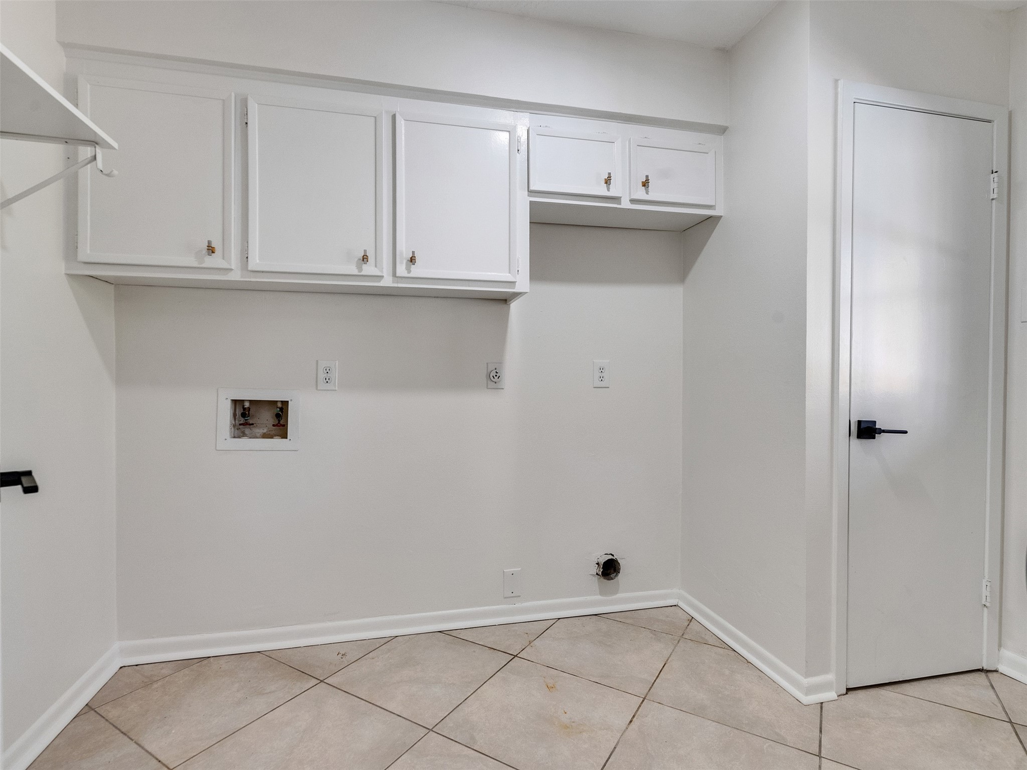 6510 Knollview Drive Spring, TX 77389 - Photo 42 of 43 a view of cabinets and utility room with closet