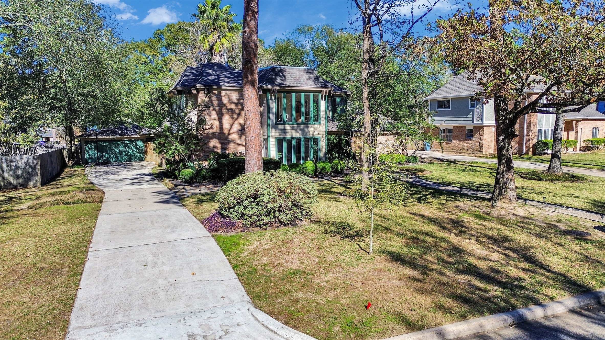 6510 Knollview Drive Spring, TX 77389 - Photo 5 of 43 a view of a pathway with a house in the background