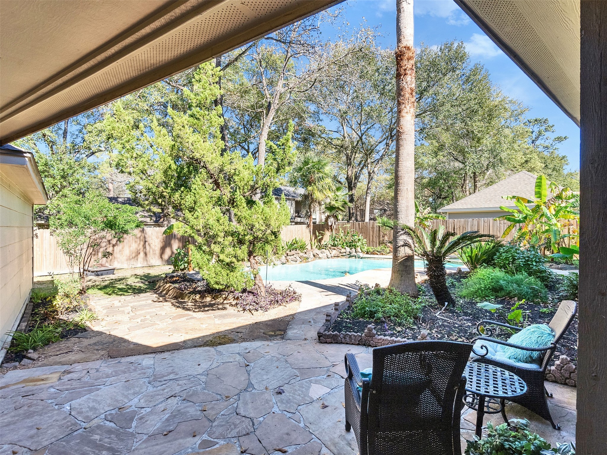 6510 Knollview Drive Spring, TX 77389 - Photo 8 of 43 a view of a backyard with plants and patio
