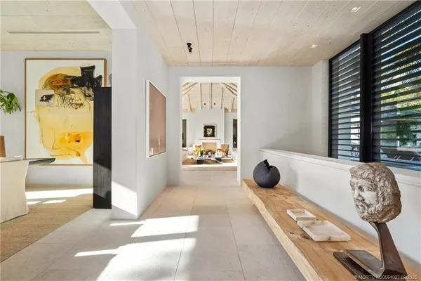 a work room with furniture and wooden floor