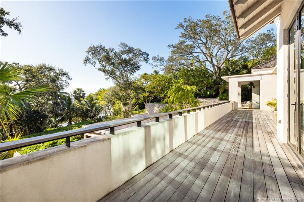 109 South River Road Stuart, FL 34996 - Photo 31 of 98 a view of balcony with wooden floor and outdoor space