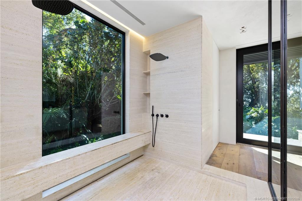 109 South River Road Stuart, FL 34996 - Photo 37 of 98 a view of a bedroom from window