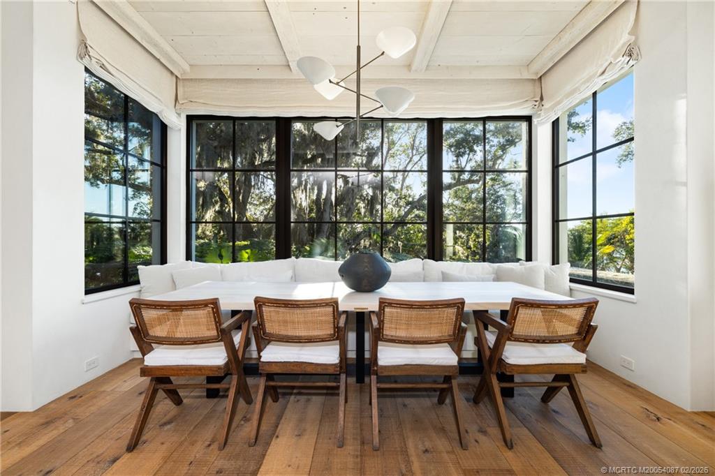 109 South River Road Stuart, FL 34996 - Photo 47 of 98 a view of a dining room with furniture window and outside view