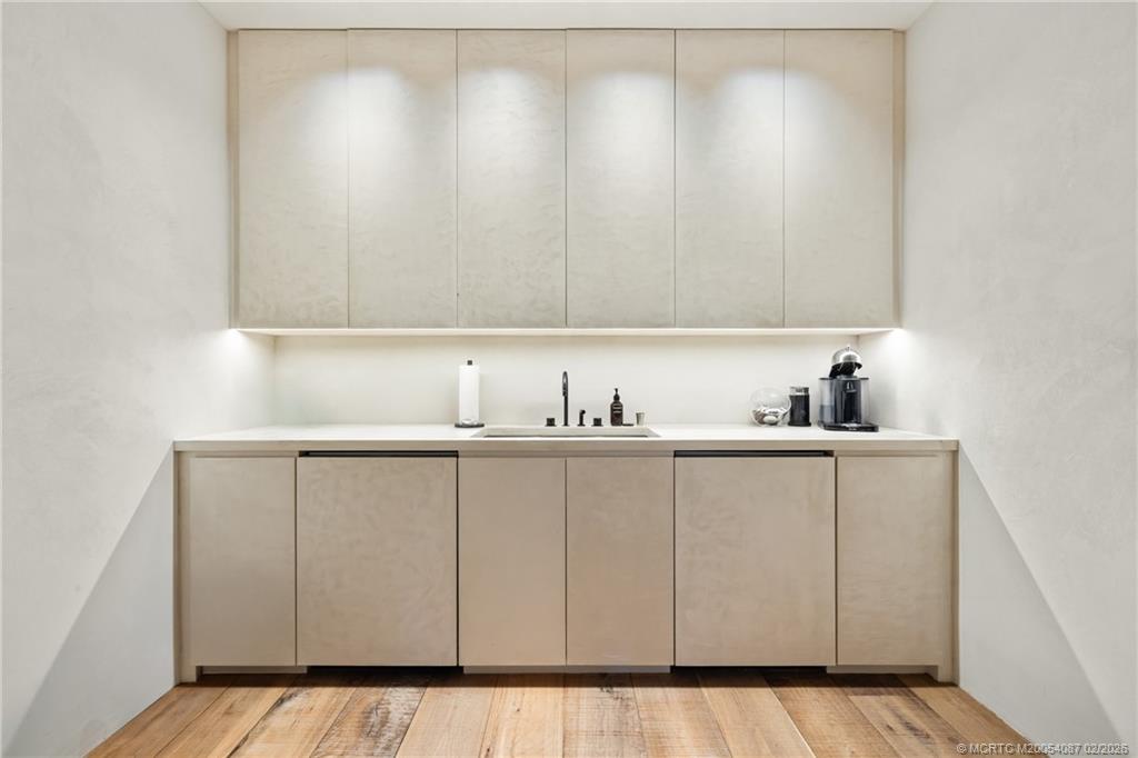 109 South River Road Stuart, FL 34996 - Photo 50 of 98 a bathroom with a sink and a mirror