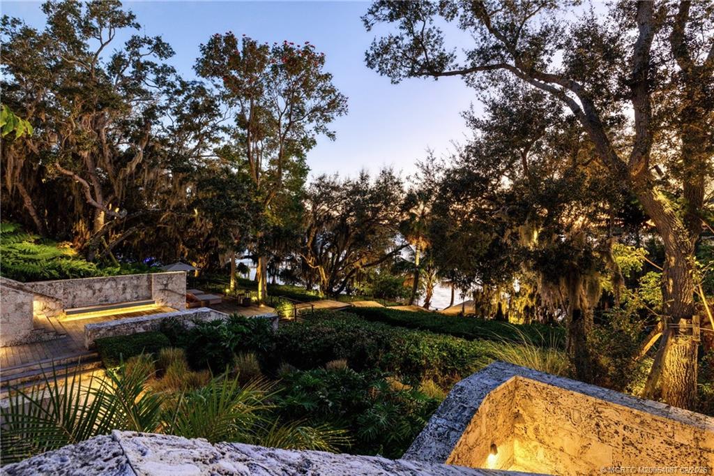 109 South River Road Stuart, FL 34996 - Photo 5 of 98 an aerial view of a house with a yard basket ball court and outdoor seating