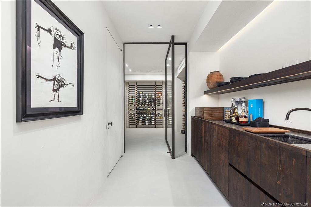109 South River Road Stuart, FL 34996 - Photo 79 of 98 a kitchen with stainless steel appliances a refrigerator and a sink