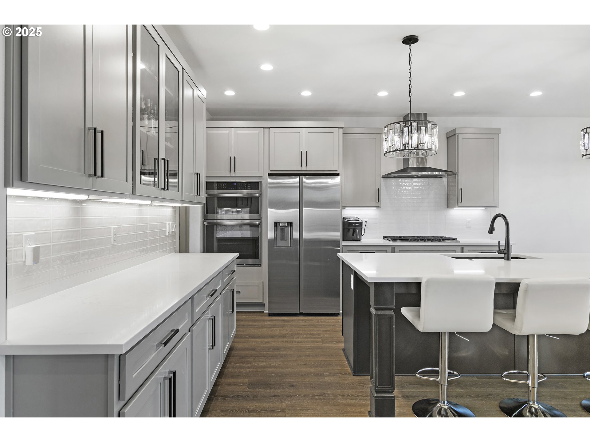 37802 Southeast Olson Street Sandy, OR 97055 - Photo 12 of 48 a kitchen with kitchen island granite countertop a sink and counter space
