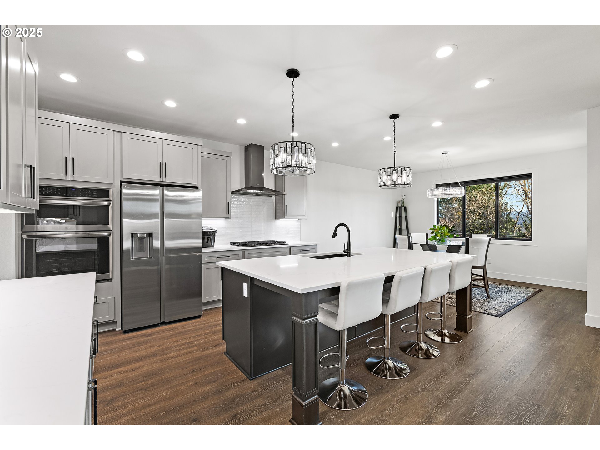 37802 Southeast Olson Street Sandy, OR 97055 - Photo 14 of 48 a kitchen with kitchen island a sink stainless steel appliances and cabinets