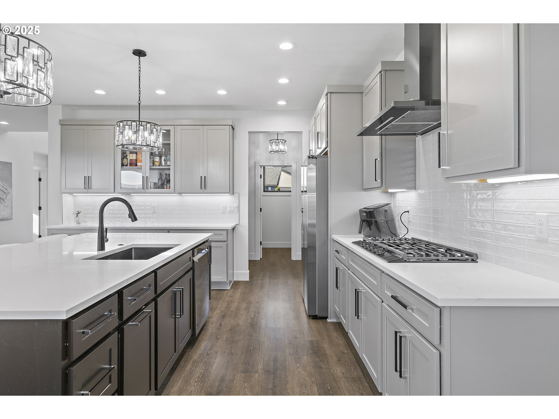 37802 Southeast Olson Street Sandy, OR 97055 - Photo 19 of 48 a kitchen with a sink stove and cabinets