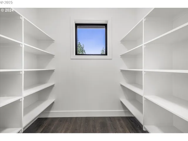 a view of a room with shelves