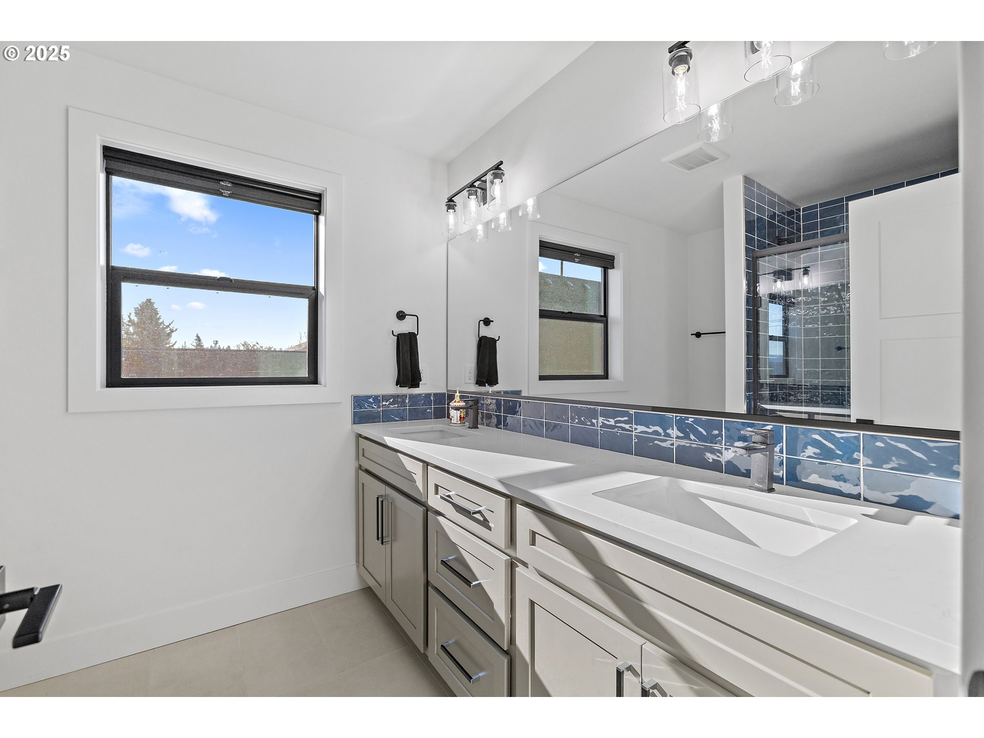 37802 Southeast Olson Street Sandy, OR 97055 - Photo 26 of 48 a bathroom with a sink double vanity and a granite
