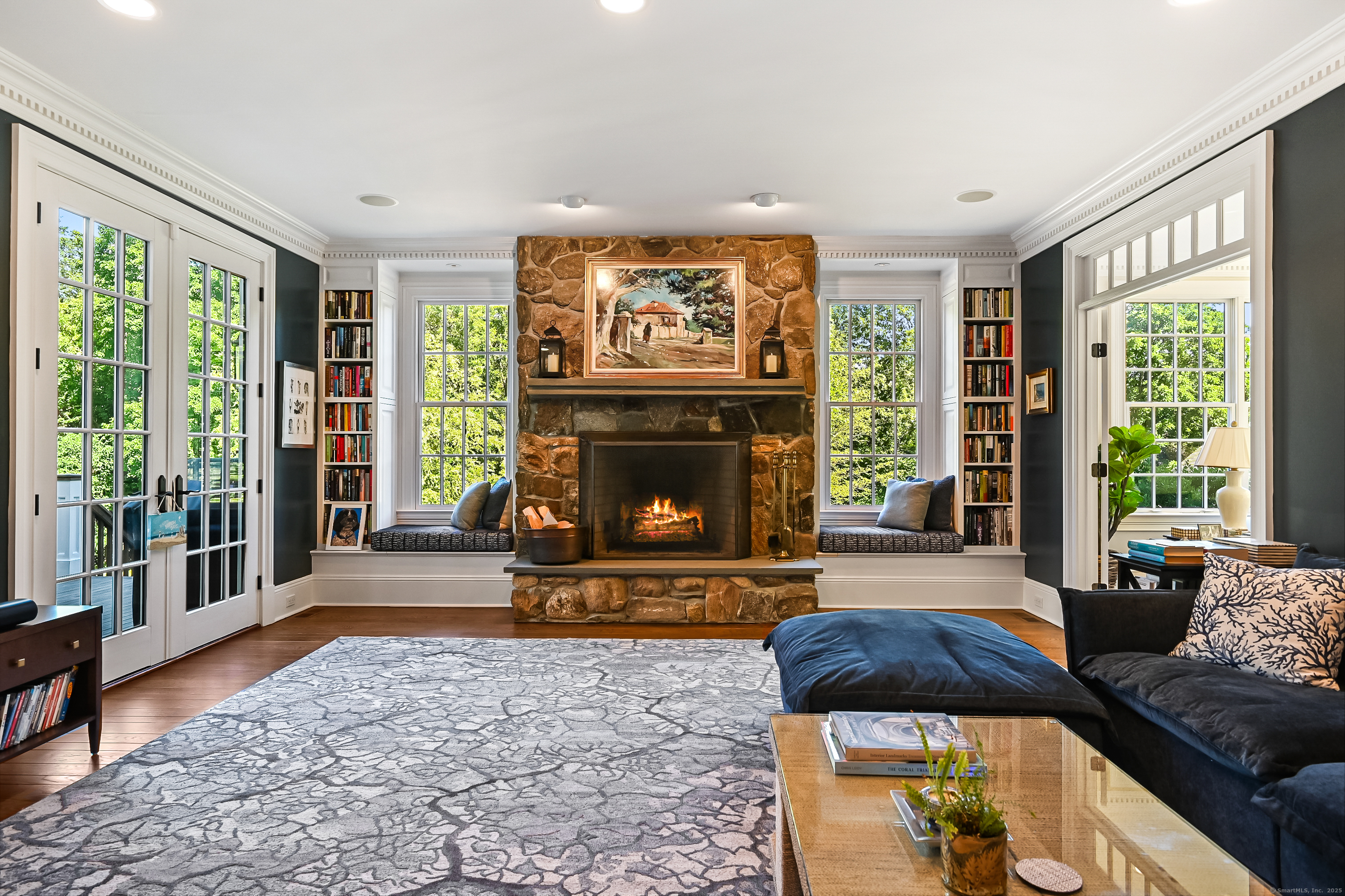 1084 Sturges Highway Fairfield, CT 06880 - Photo 14 of 40 a living room with furniture and a fireplace