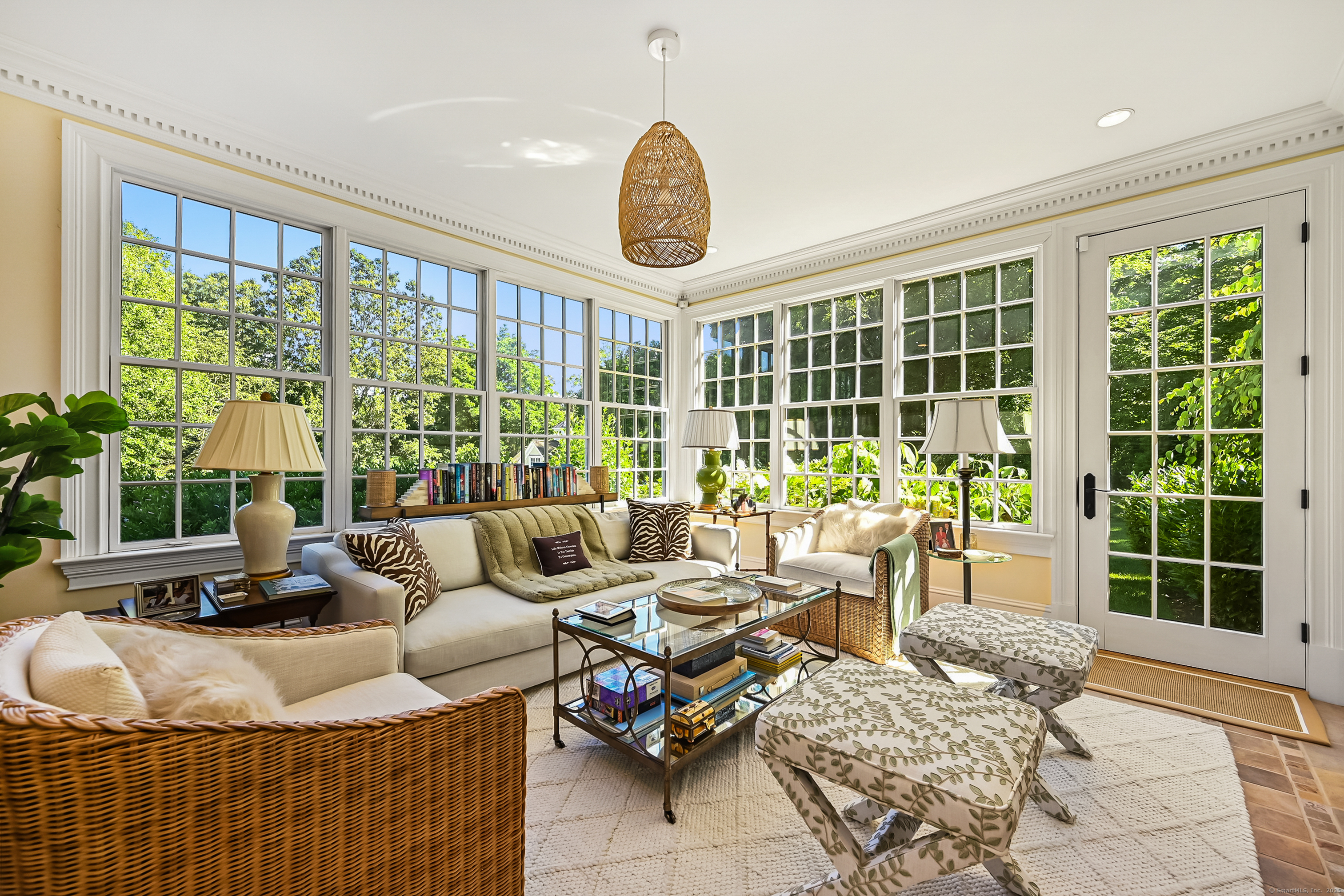 1084 Sturges Highway Fairfield, CT 06880 - Photo 17 of 40 a living room with furniture and a large window