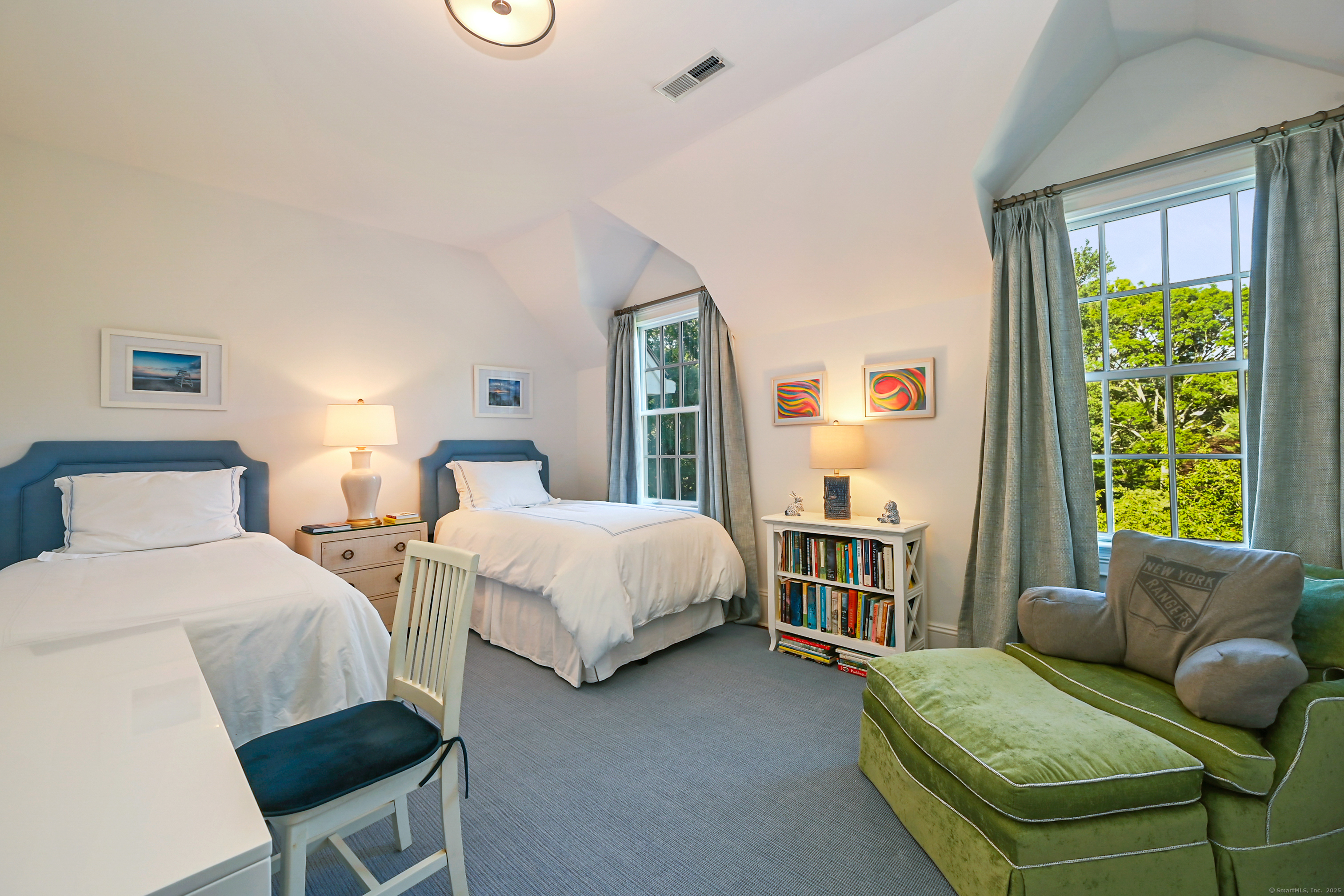 1084 Sturges Highway Fairfield, CT 06880 - Photo 23 of 40 a bedroom with two beds and a large window