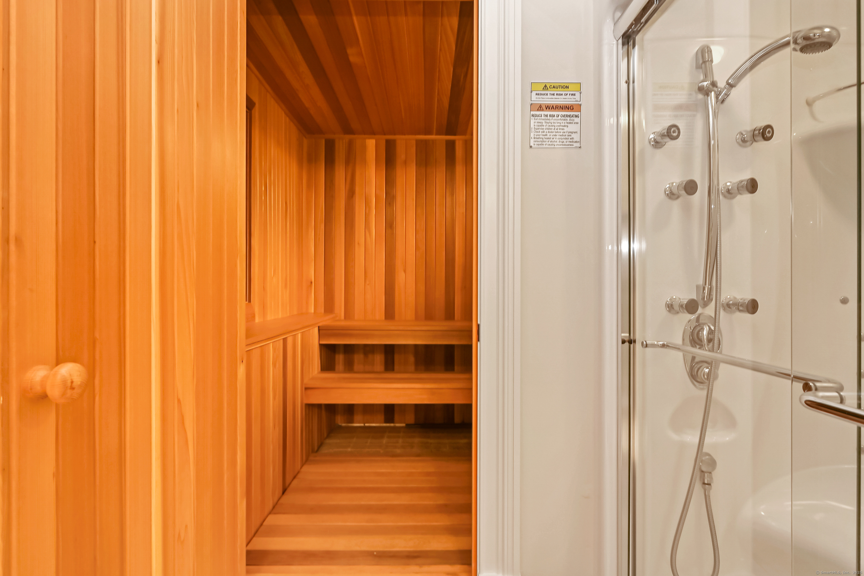 1084 Sturges Highway Fairfield, CT 06880 - Photo 26 of 40 a view of a bathroom with a shower curtain