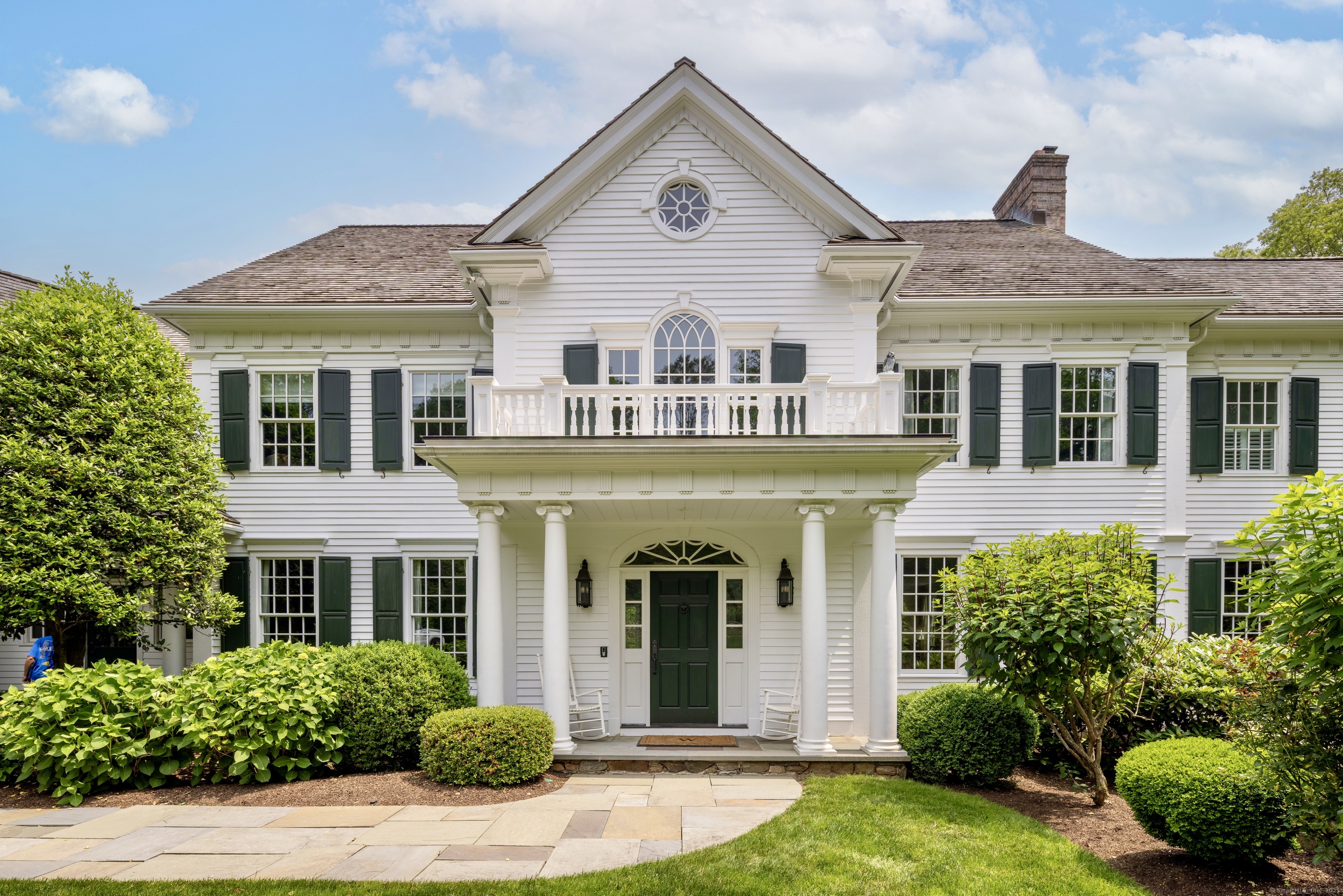 1084 Sturges Highway Fairfield, CT 06880 - Photo 3 of 40 front view of a house with a yard