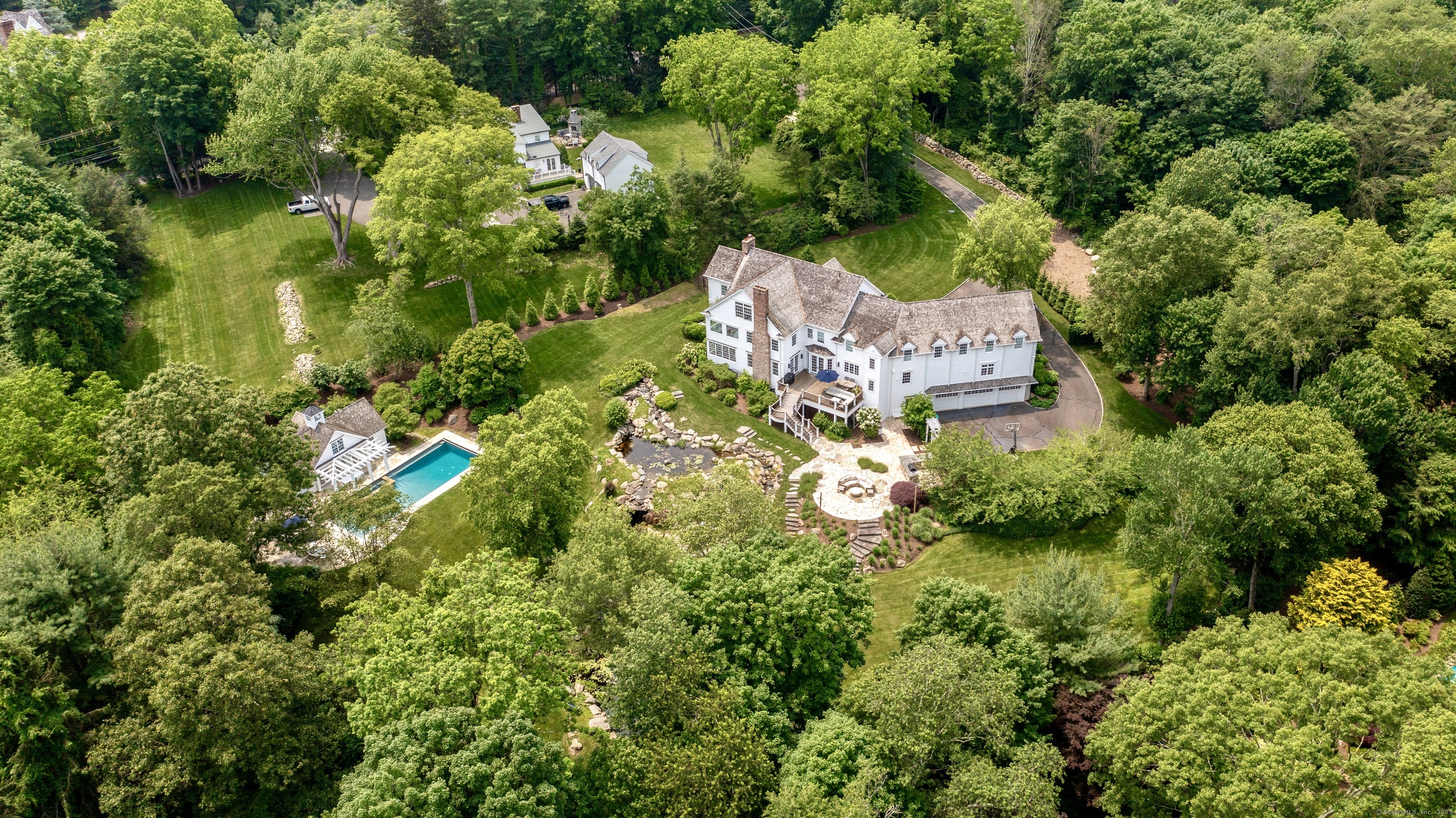 1084 Sturges Highway Fairfield, CT 06880 - Photo 40 of 40 an aerial view of residential house with outdoor space and trees all around