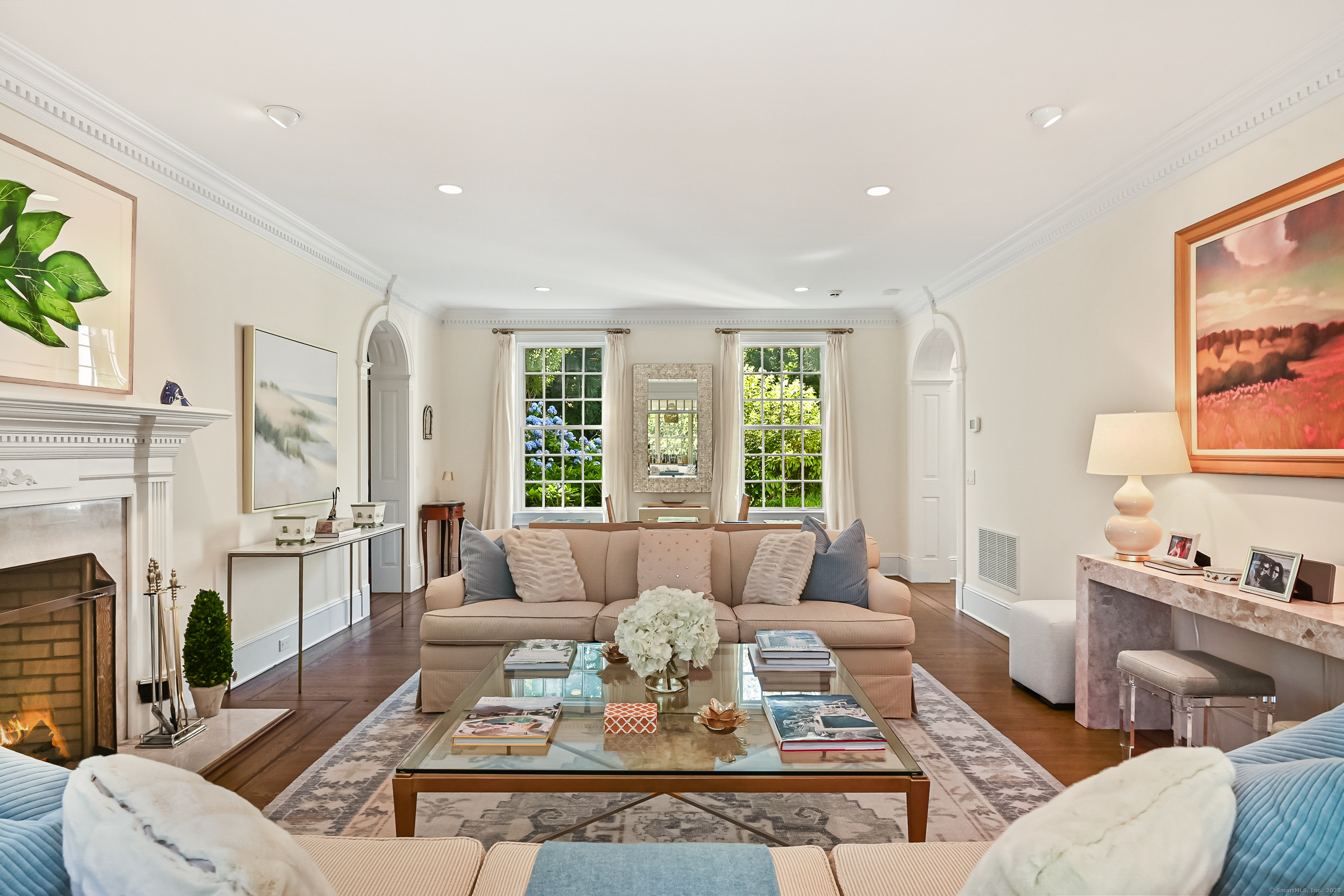 1084 Sturges Highway Fairfield, CT 06880 - Photo 7 of 40 a living room with fireplace furniture and a large window