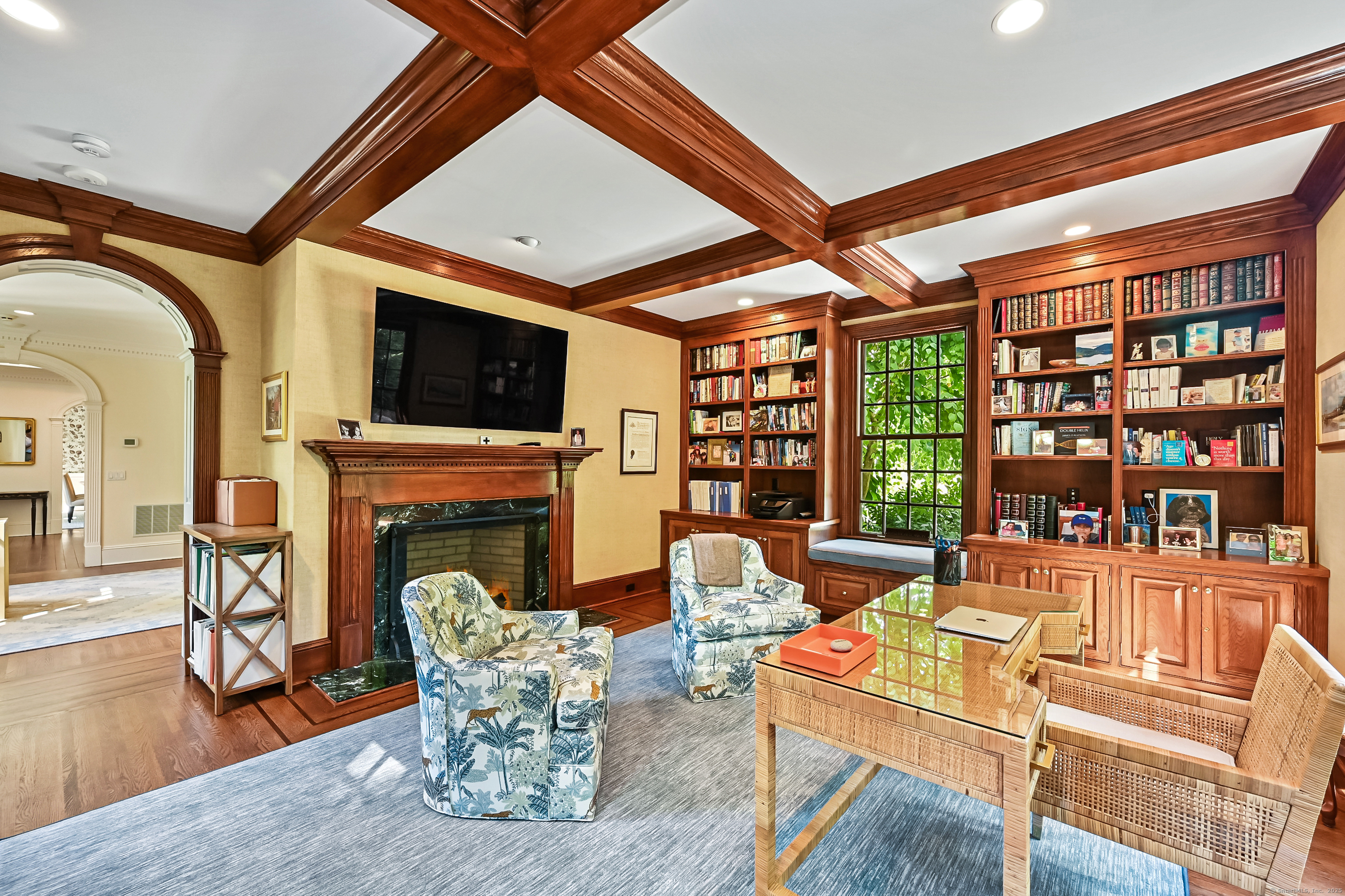 1084 Sturges Highway Fairfield, CT 06880 - Photo 8 of 40 a living room with fireplace furniture and a flat screen tv