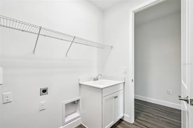a view of an house with backyard space and balcony