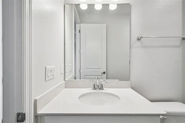 a picture of a bench in a bathroom