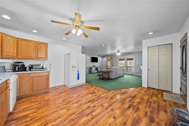 a bedroom with a bed and dresser