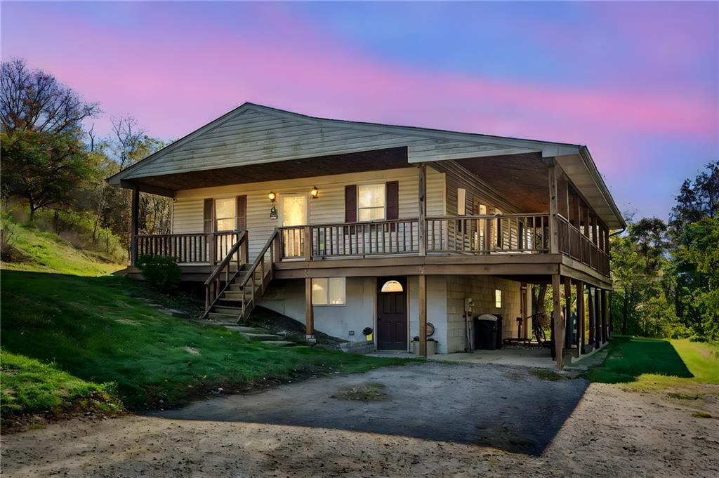 573 Shaffer Road Hookstown, PA 15050 - Photo 2 of 41 a front view of a house with garden
