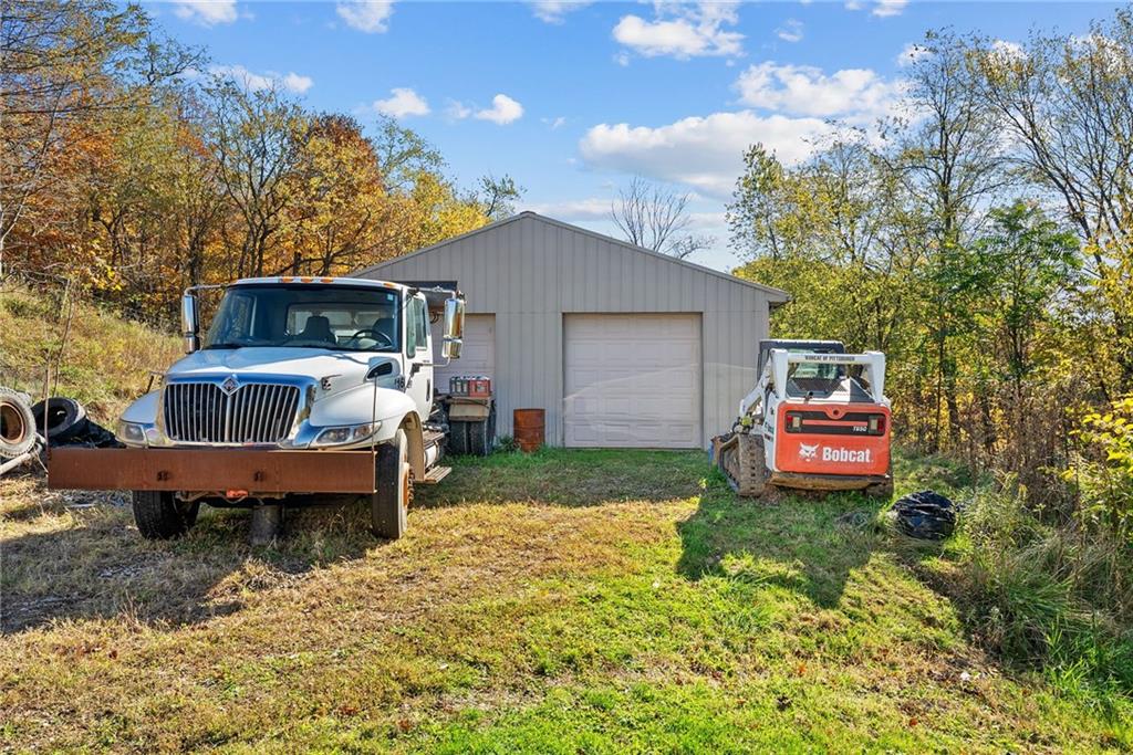 573 Shaffer Road Hookstown, PA 15050 - Photo 34 of 41 a front view of a house with garden