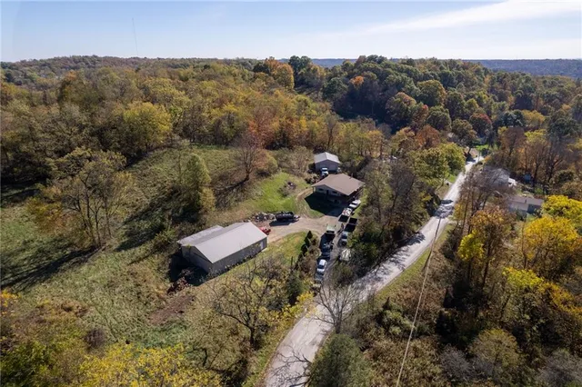 an aerial view of residential house with outdoor space