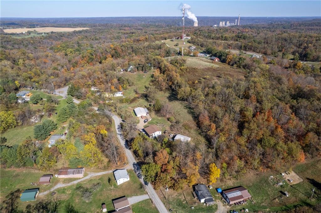 573 Shaffer Road Hookstown, PA 15050 - Photo 39 of 41 an aerial view of residential houses with outdoor space and trees