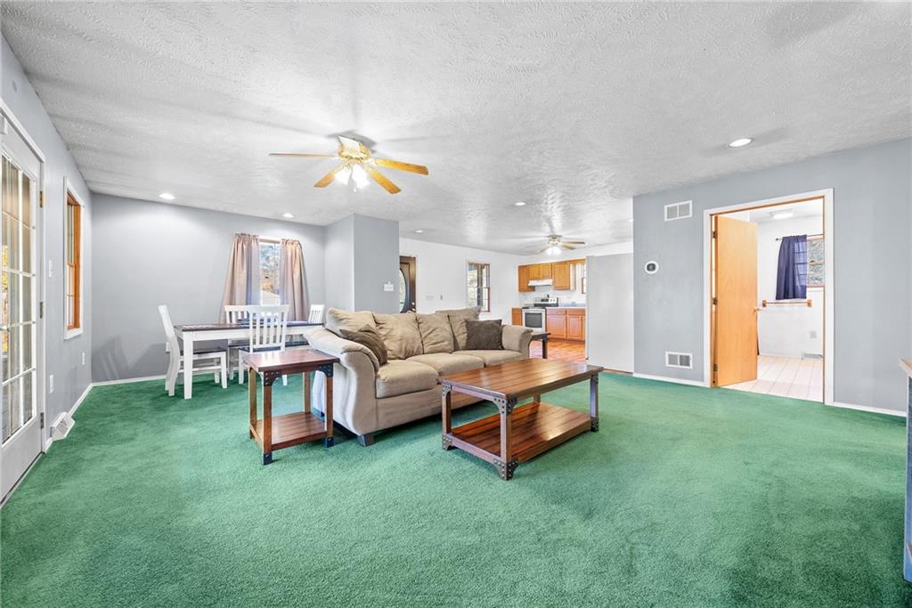 573 Shaffer Road Hookstown, PA 15050 - Photo 5 of 41 a living room with furniture and a ceiling fan