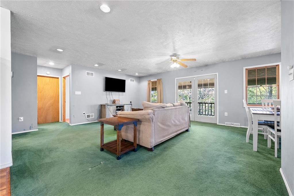 573 Shaffer Road Hookstown, PA 15050 - Photo 7 of 41 a living room with furniture and a flat screen tv
