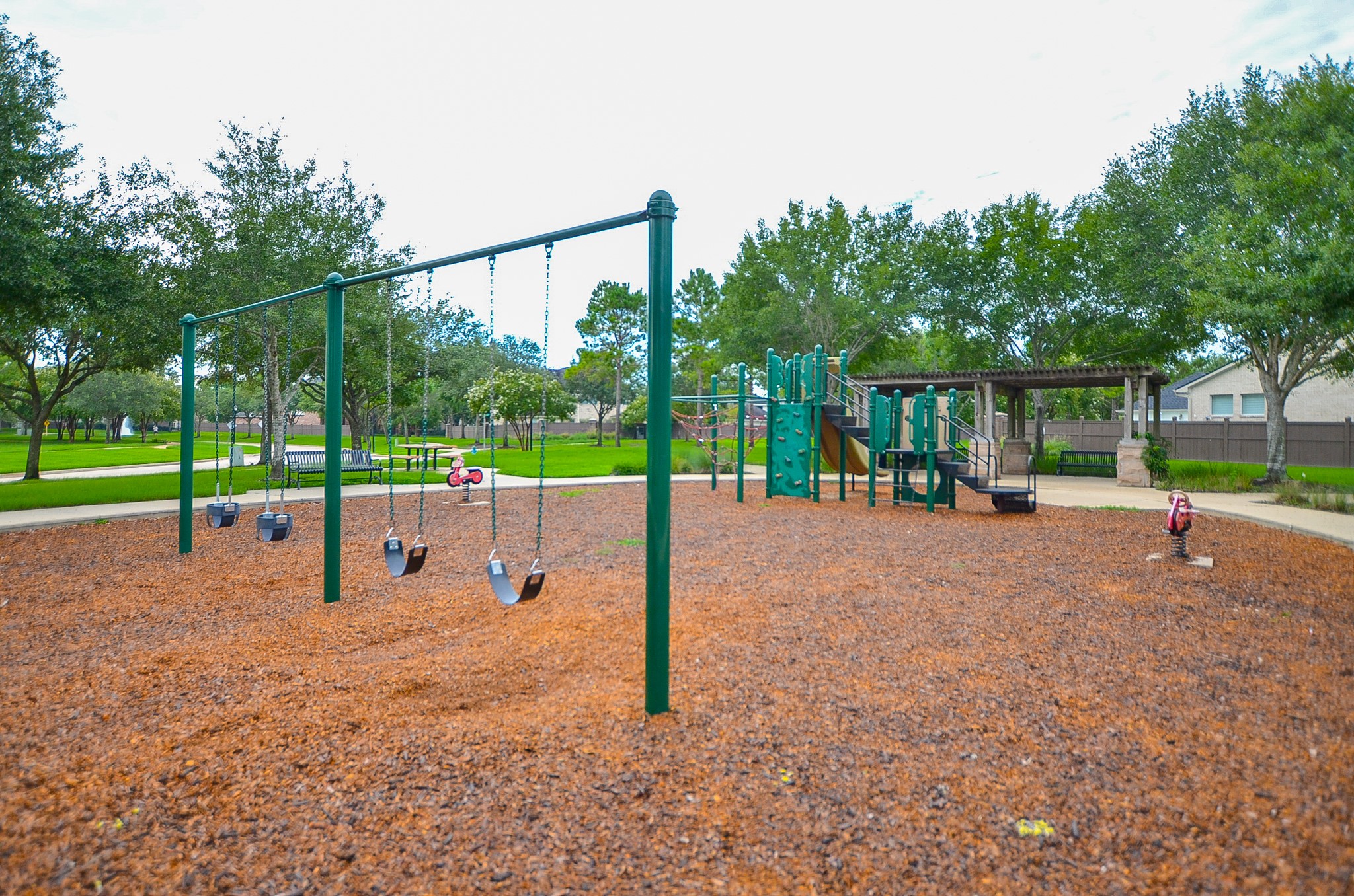 7218 Spring Run Lane Katy, TX 77494 - Photo 47 of 49 a view of a park with swings