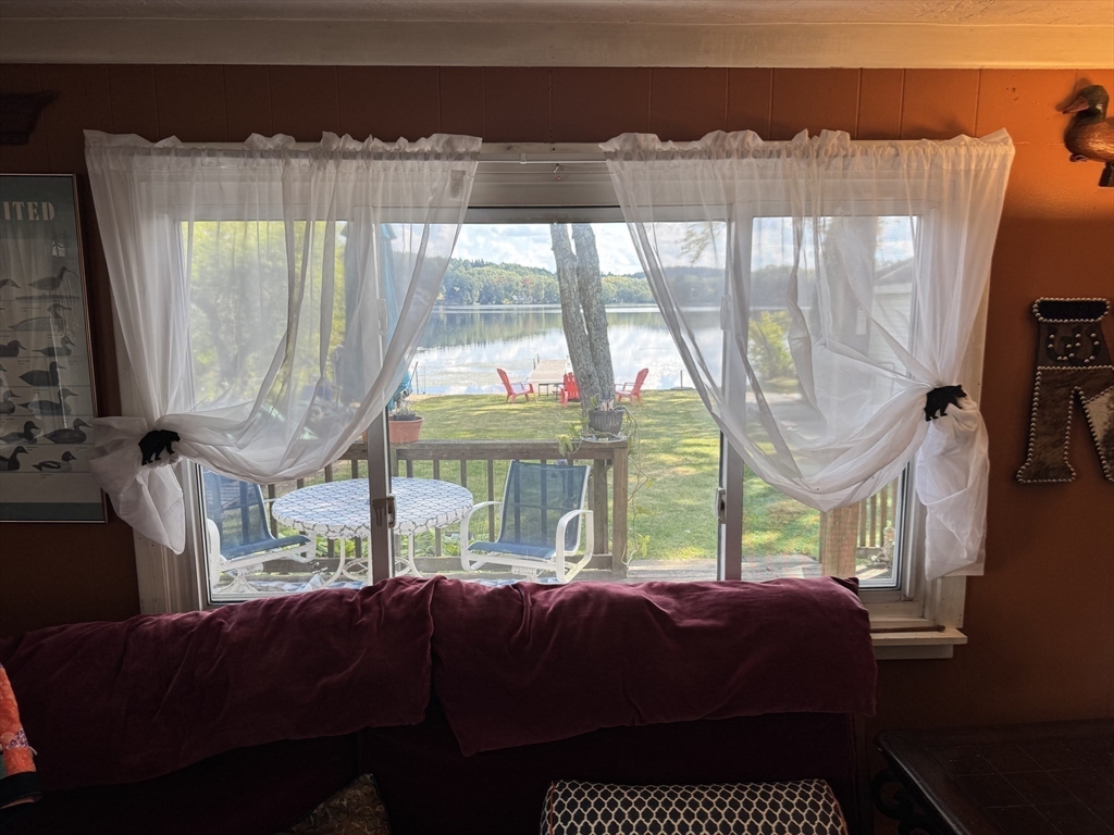 116 Brookfield Road Brimfield, MA 01010 - Photo 13 of 26 a balcony with furniture and a large window