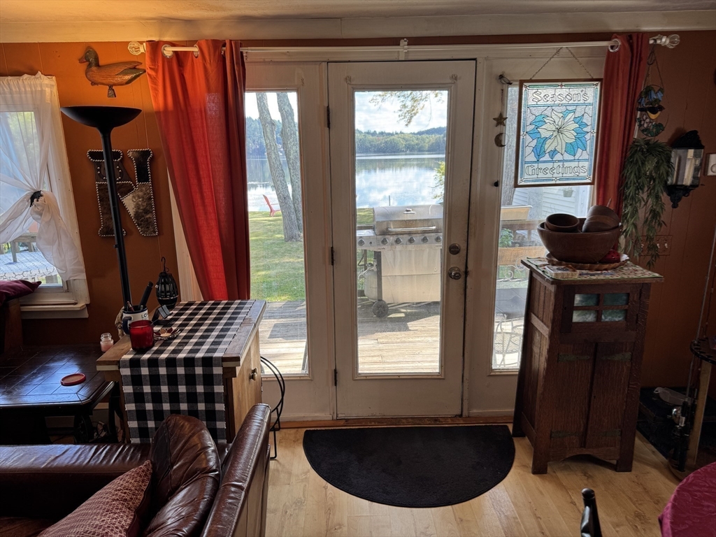 116 Brookfield Road Brimfield, MA 01010 - Photo 15 of 26 a view of a balcony with chairs and a potted plant