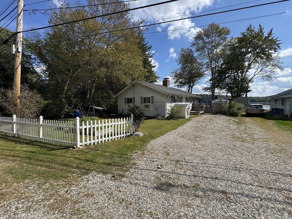 116 Brookfield Road Brimfield, MA 01010 - Photo 24 of 26 a front view of a house with a yard