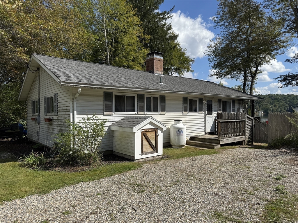 116 Brookfield Road Brimfield, MA 01010 - Photo 4 of 26 a view of a house with backyard porch and sitting area