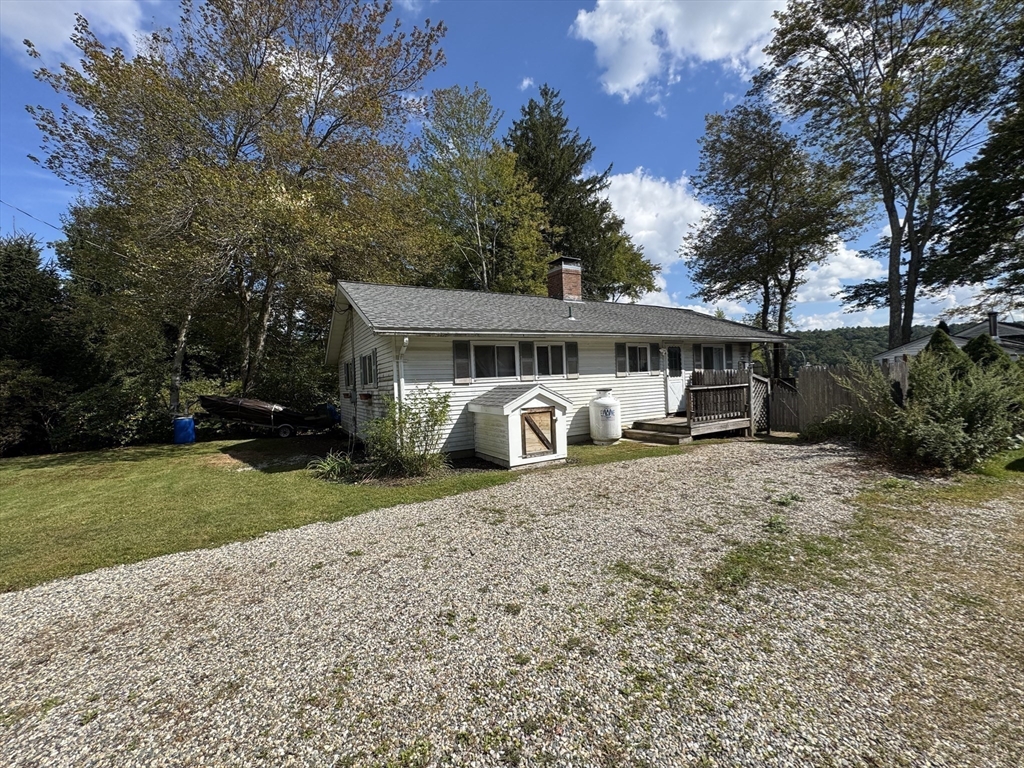 116 Brookfield Road Brimfield, MA 01010 - Photo 5 of 26 a view of a house with backyard and a tree