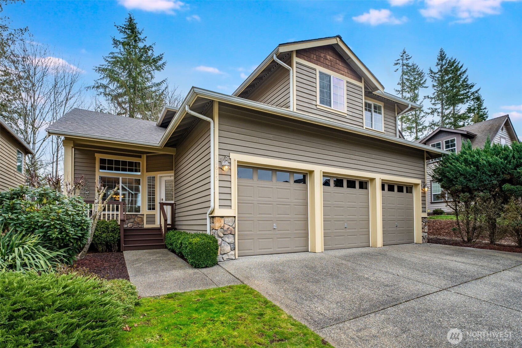 18615 13th Drive Southeast Bothell, WA 98012 - Photo 2 of 38 a front view of a house with garden