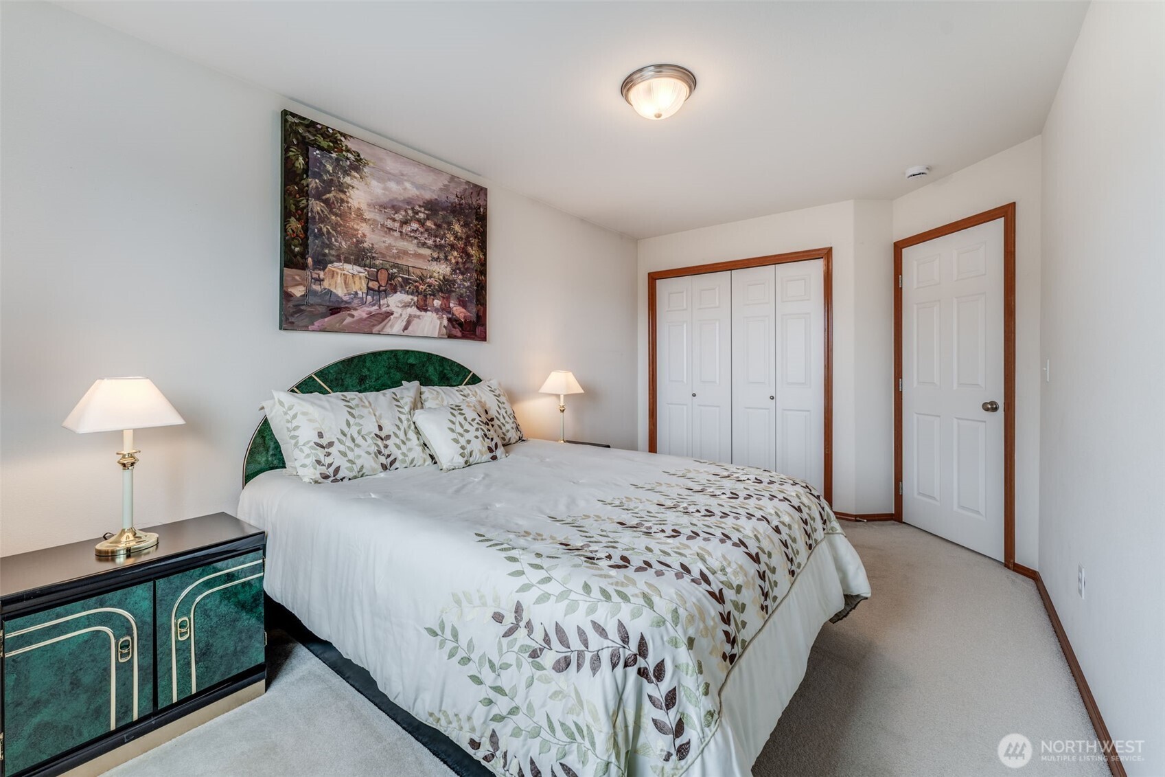 18615 13th Drive Southeast Bothell, WA 98012 - Photo 21 of 38 a bedroom with a bed and a lamp