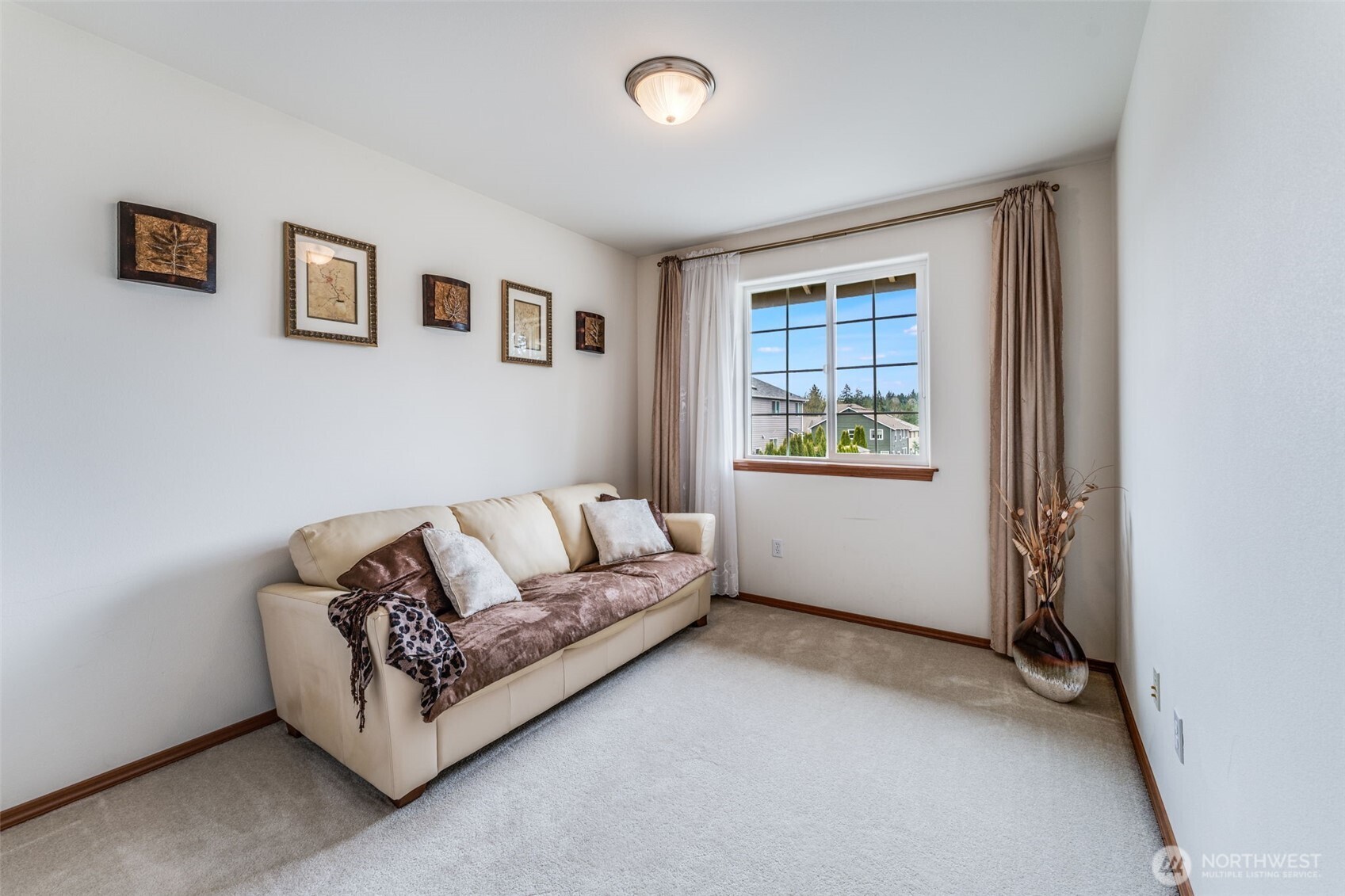 18615 13th Drive Southeast Bothell, WA 98012 - Photo 22 of 38 a living room with furniture and a window