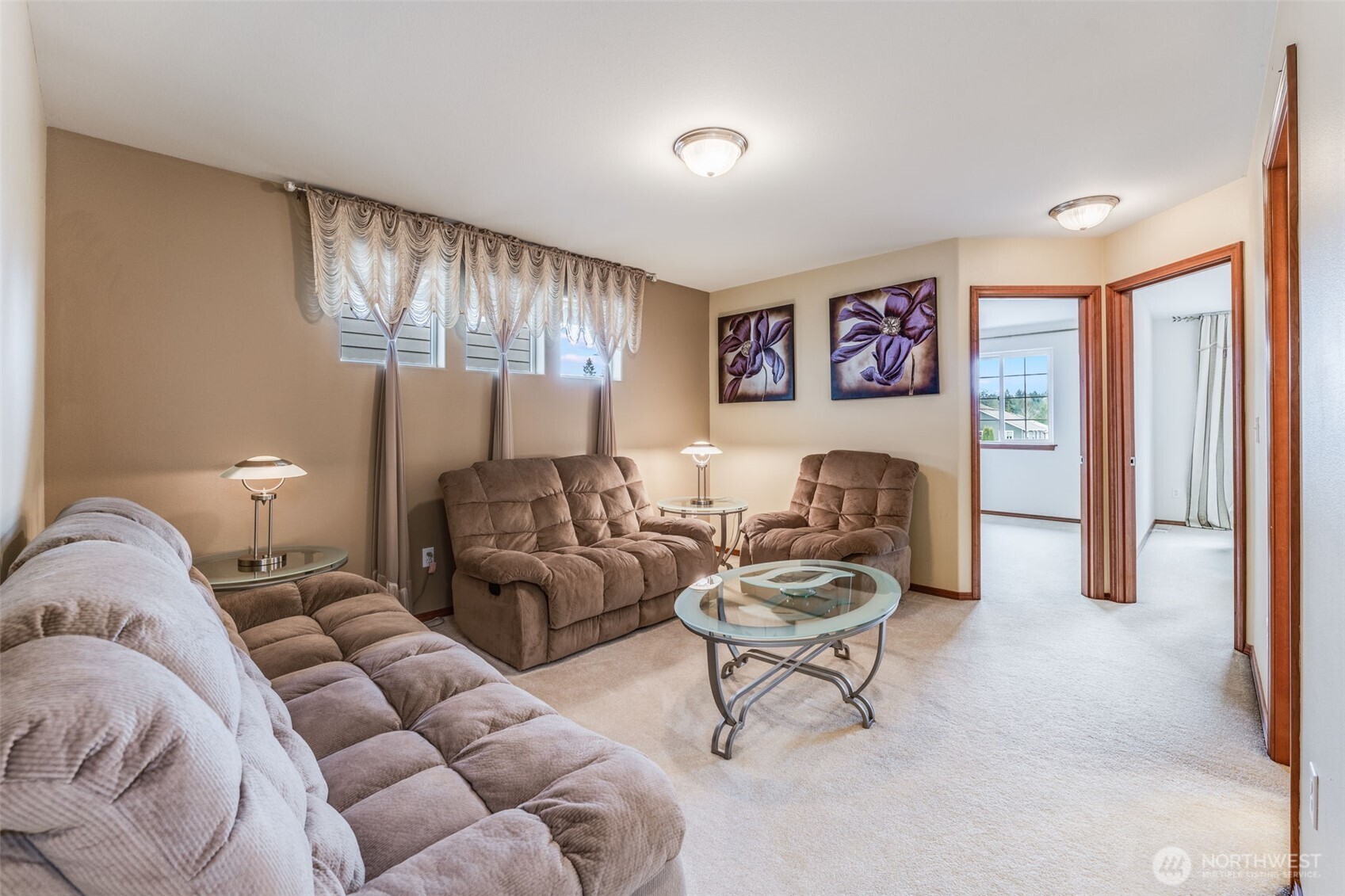 18615 13th Drive Southeast Bothell, WA 98012 - Photo 24 of 38 a living room with furniture and a chandelier