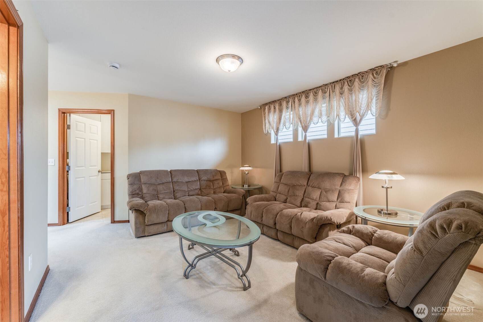 18615 13th Drive Southeast Bothell, WA 98012 - Photo 25 of 38 a living room with furniture and a large window