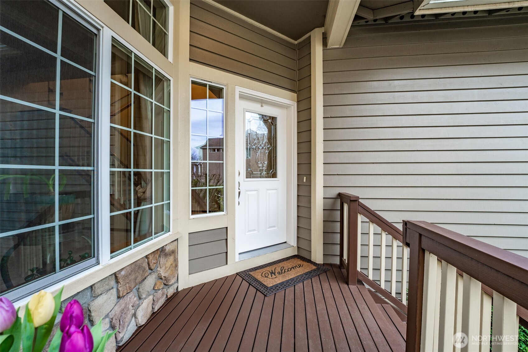 18615 13th Drive Southeast Bothell, WA 98012 - Photo 3 of 38 a view of front door deck and wooden floor