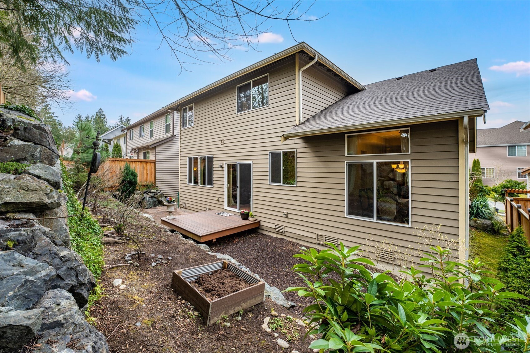 18615 13th Drive Southeast Bothell, WA 98012 - Photo 34 of 38 a backyard of a house with seating space
