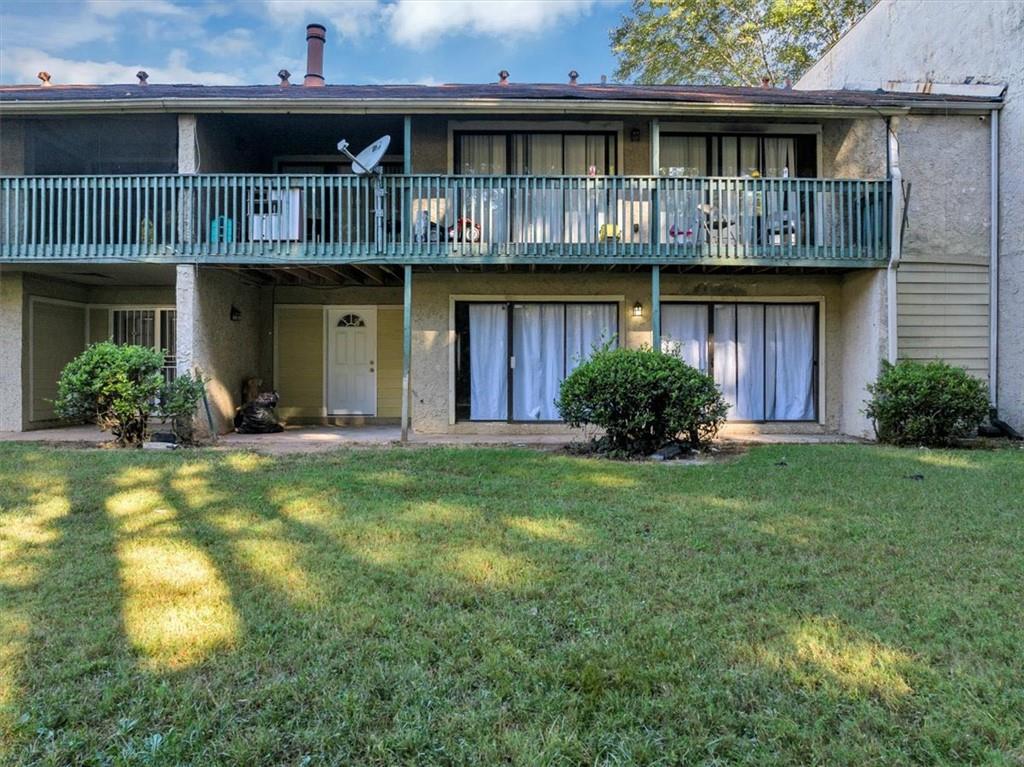 3575 Oakvale Road, Unit 302 Decatur, GA 30034 - Photo 10 of 10 a front view of a house with garden