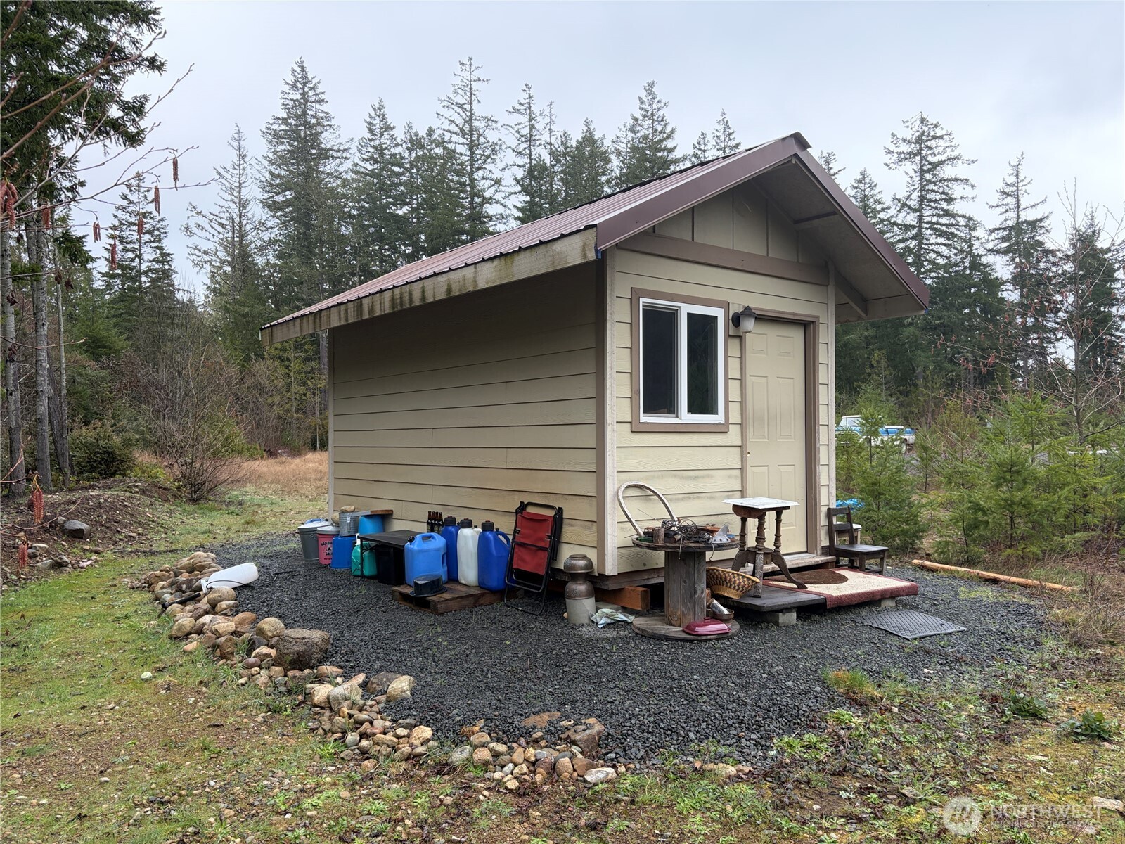 156 Whitney Road Quilcene, WA 98376 - Photo 3 of 36 a view of a house with backyard